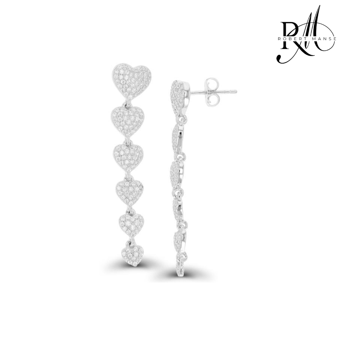 Heart-shaped silver earrings on a white background with a brand logo.