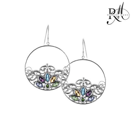 Pair of earrings with colorful gemstones on a white background