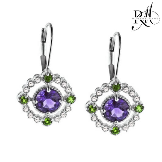 Pair of earrings with purple gemstones and green accents on a white background