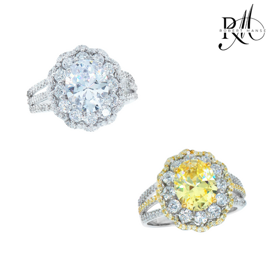 Two diamond rings, one with a large central stone and the other with a yellow gemstone, on a white background.