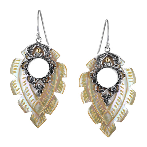 Yellow mother of pearl earrings with a cut out and sterling silver filigree design